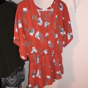 Beautiful dark Orange tinted with Red, Blue Flower